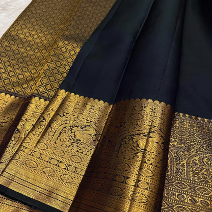 Elegant Black Banarasi Soft Silk Saree with Golden Peacock & Floral Zari Weaving