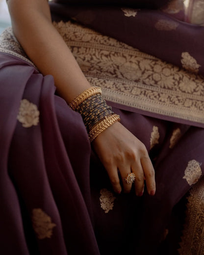Elegant Deep Maroon Banarasi Soft Silk Saree with Intricate Gold Zari Weaving