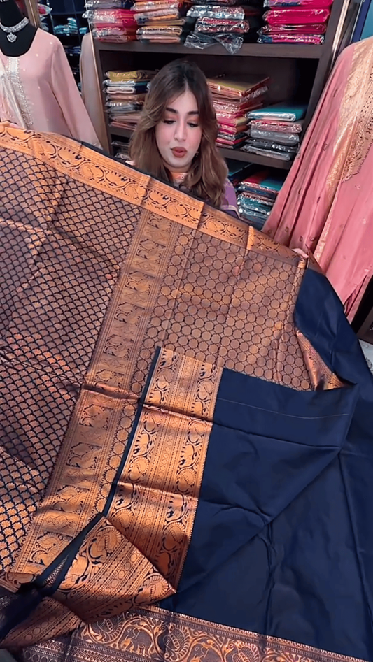 Regal Rust – Banarasi Soft Silk Saree with Majestic Elephant Zari Border
