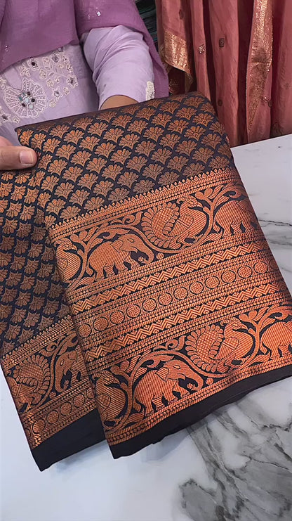 Regal Rust – Banarasi Soft Silk Saree with Majestic Elephant Zari Border